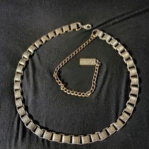 Silver chain belt with detailed scroll work. Item #1913